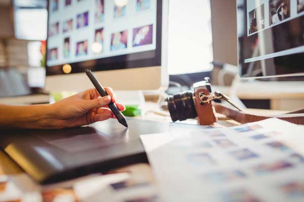 Graphic Designer Using Graphic Tablet