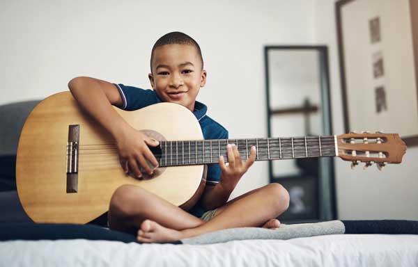 Playing The Guitar At Home